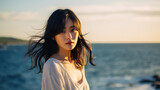 夏の海に来た悲しい表情のアジア人女性・失恋・女優・モデル
