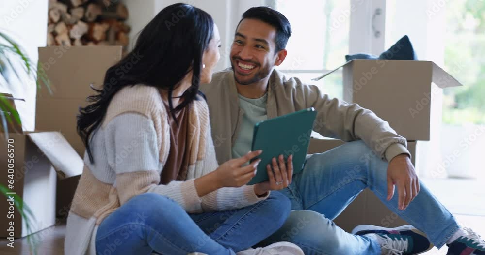 Couple, pointing and tablet in new house, floor and planning together with thinking, idea or fresh start in living room. Man, woman and chat by boxes, cardboard package or moving at apartment lounge