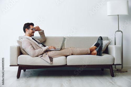 Man couch sofa business laptop home call video