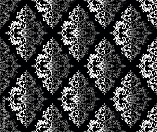 Wallpaper in the style of Baroque. Seamless vector background. White and black floral ornament. Graphic pattern for fabric, wallpaper, packaging. Ornate Damask flower ornament