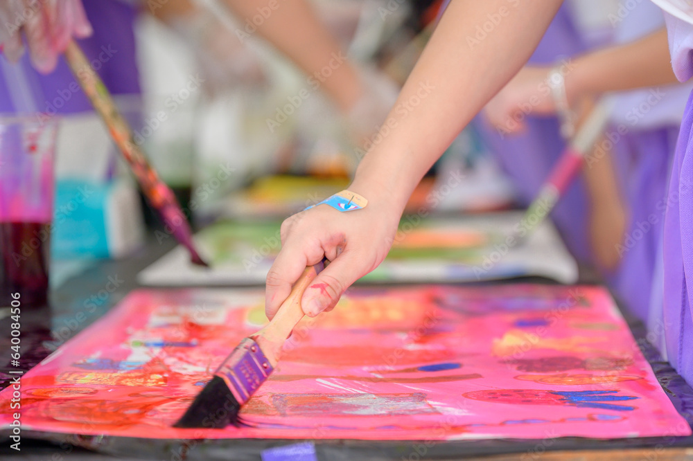 Children and friends paint with their own creativity in colorful colors