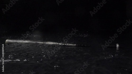 Super Slow Motion Shot of baseball ball and bat at 1000 fps. Waterfall at 1000 frames per second. Sport concept super slow motion shot on high speed camera 1000 fps. 