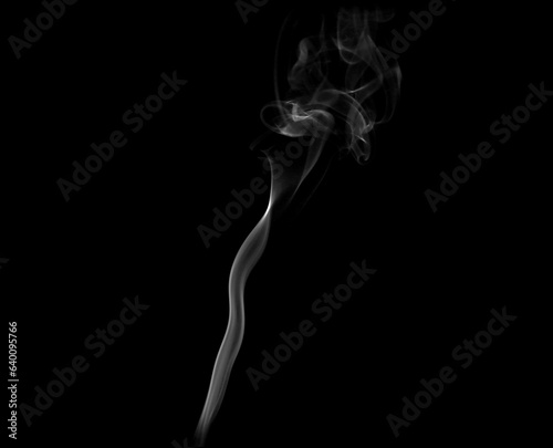 White smoke or steam smog moves on a black background. Beautiful gray smoke