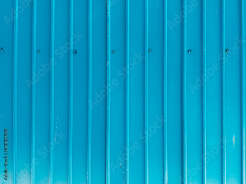 The steel walls are lined up in a blue pattern