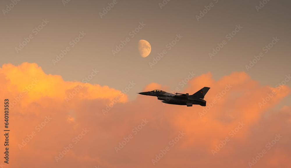 Bucharest International Air Show. F16 military fighter airplane flying under the moon. Military aviation aircrafts and war missiles industry.