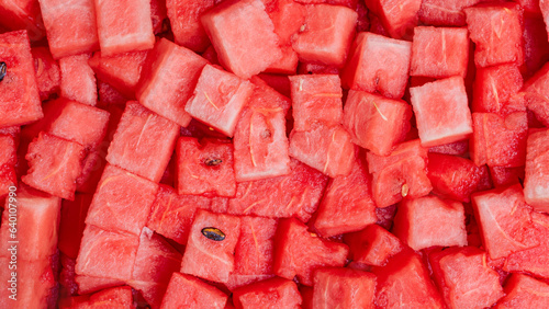 Top view of fresh red watermelon slices background. Healthy eating concept
