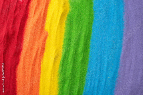 Sand flag embodies LGBT history month support. Top view displays a rainbow sand flag, including an open space for empowering and affirming words