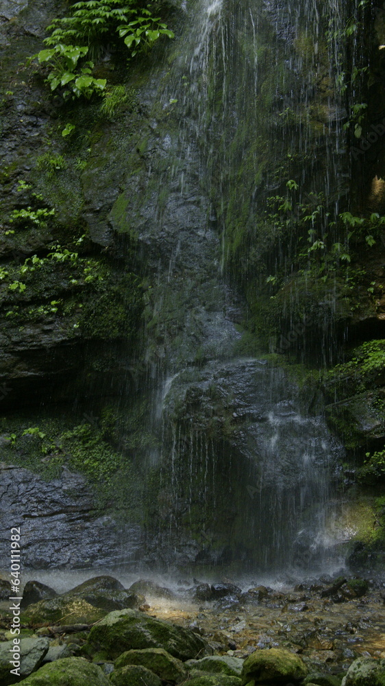 Waterfall deep in the mountains Waterfall deep in the mountains