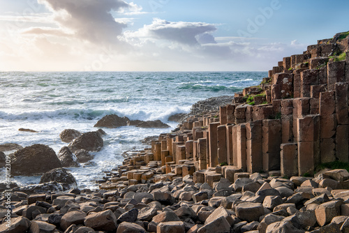 Evening seaside landscape at Giants Causeway in Northern Ireland. Copy space in sky.