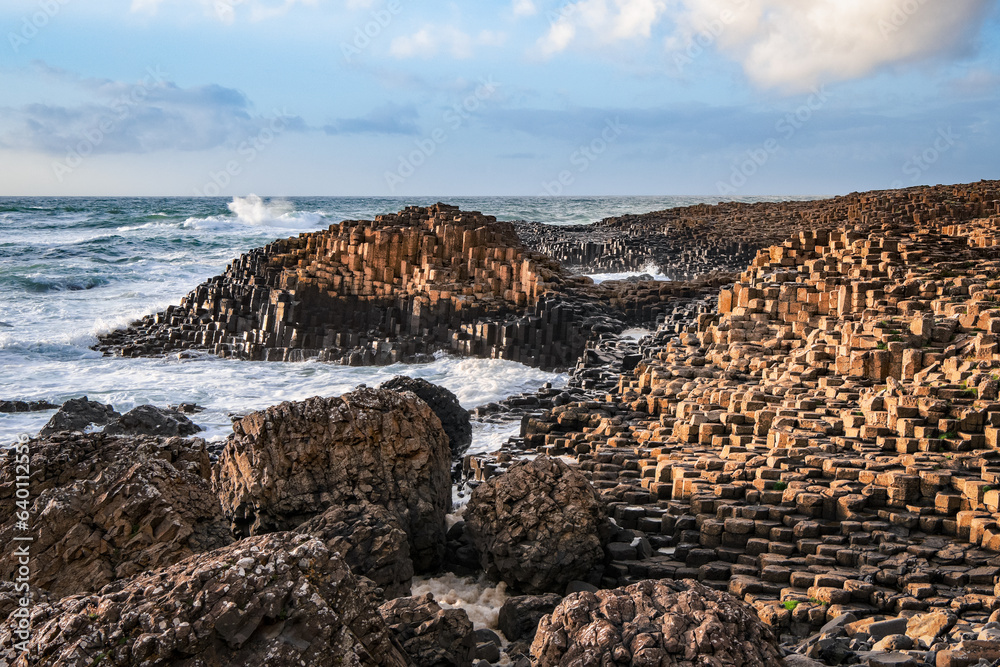 View of basalt columns coast at Giants Causeway in Northern Ireland. Copy space in sky.