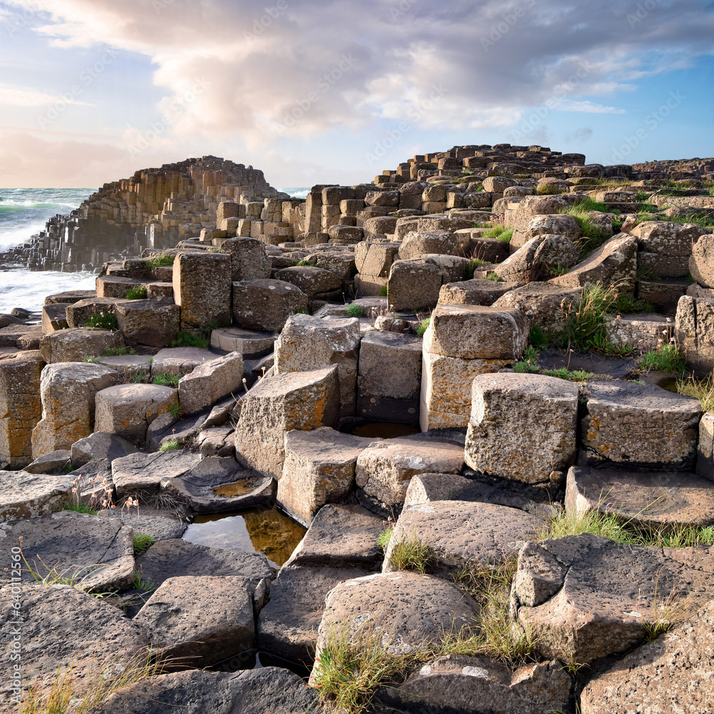 Close up view to stone formations at Giants Causeway in evening, Northern Ireland.