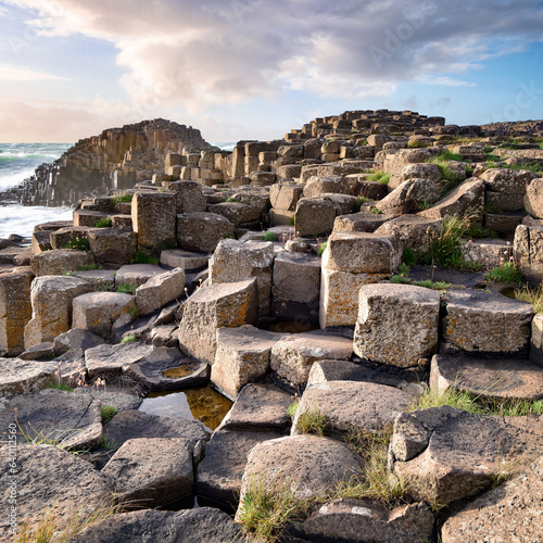 Close up view to stone formations at Giants Causeway in evening, Northern Ireland.