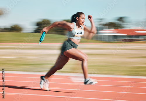 Fast, race and athlete running relay sprint in competition or fitness game or training for energy wellness on a track. Sports, stadium and athletic person or runner exercise, speed and workout