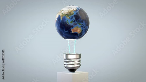 Earth planet revolving on a lightbulb with lightnings, loop photo