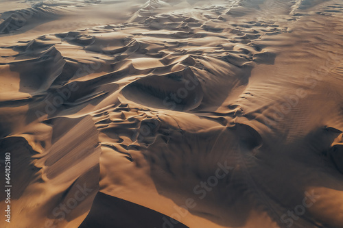 Aerial sunset photo of desert textures in Huacachina, Ica, Peru, South America