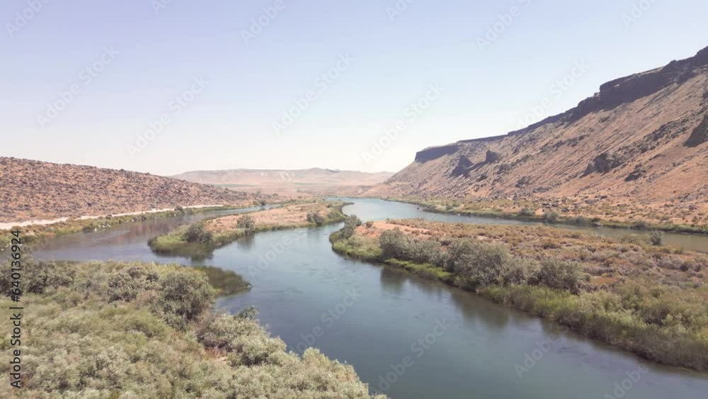 The mighty Snake River in Idaho that meanders across the landscape and creates natural islands that feed all manner of birds and animals. The mighty Snake River in Idaho that meanders across the landscape and creates natural islands that feed all manner of birds and animals.