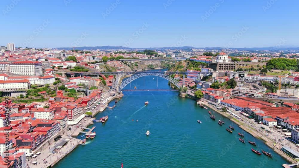 Porto, Portugal: Aerial view of famous historic European city, center with iconic Luís I Bridge (Ponte Luís I) over Douro river, Ribeira district - landscape panorama of Southern Europe from above Porto, Portugal: Aerial view of famous historic European city, center with iconic Luís I Bridge (Ponte Luís I) over Douro river, Ribeira district - landscape panorama of Southern Europe from above