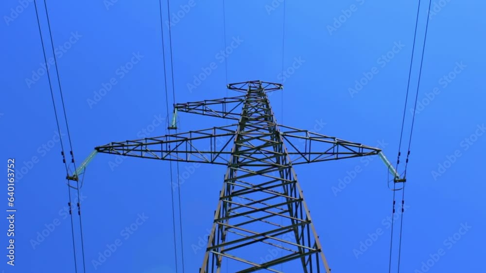 tall electric masts against cloudy sky - timelapse tall electric masts against cloudy sky - timelapse