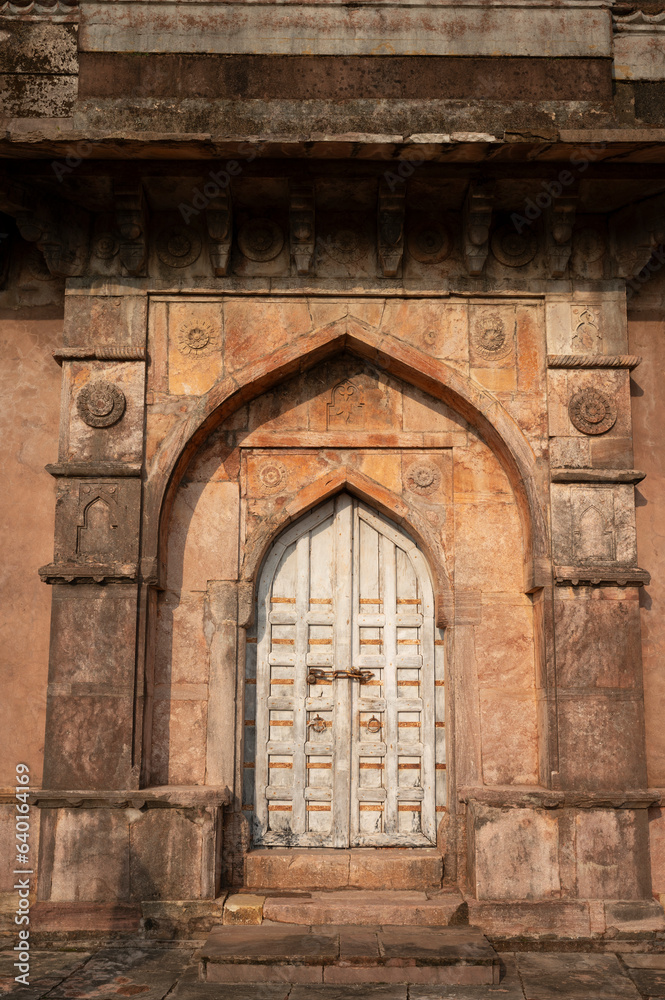 Carved door of the tomb of Roza of Khadija Bibi located in Mandu, Madhya Pradesh, India