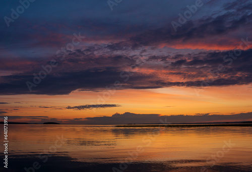 natural landscape with a beautiful sunset over the wide northern lake