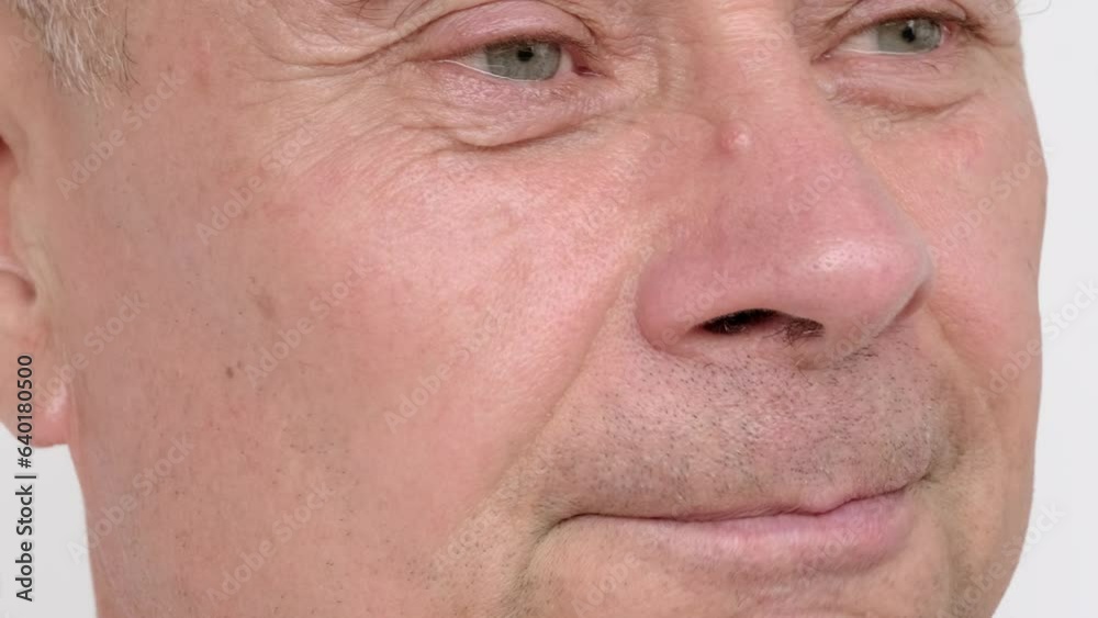 close-up face of funny man, senior, male joker laughs cheerfully, concept of emotions of elderly, happiness, laughter prolongs life, expression of laughter and enjoyment may vary across societies close-up face of funny man, senior, male joker laughs cheerfully, concept of emotions of elderly, happiness, laughter prolongs life, expression of laughter and enjoyment may vary across societies