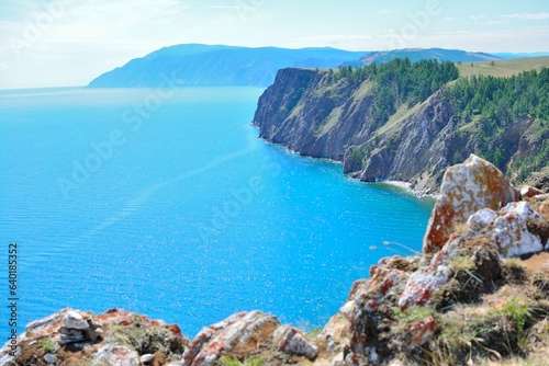 Baikal Costline, Olkhon island. Panoramic view of the Baikal coastline, with vertical rocky cliffs.