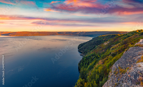 Exciting sunrise on Bakotska Bay. Colorful summer scene of Dnister river  Ukraine  Europe. Beauty of nature concept background.