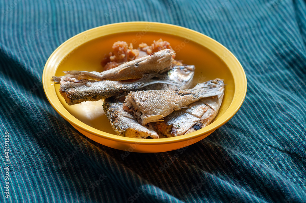 Dry fried milkfish ready to eat