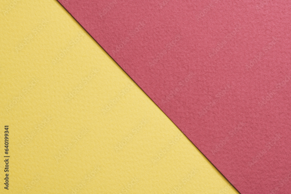 Rough kraft paper background, paper texture red burgundy yellow colors. Mockup with copy space for text. Rough kraft paper background, paper texture red burgundy yellow colors. Mockup with copy space for text.