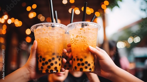 Obraz na płótnie Closeup hand holding Asian drink tapioca bubbles milk tea. w salonie