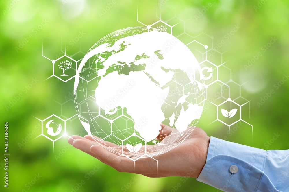 Hand of human with earth globe and ESG icon
