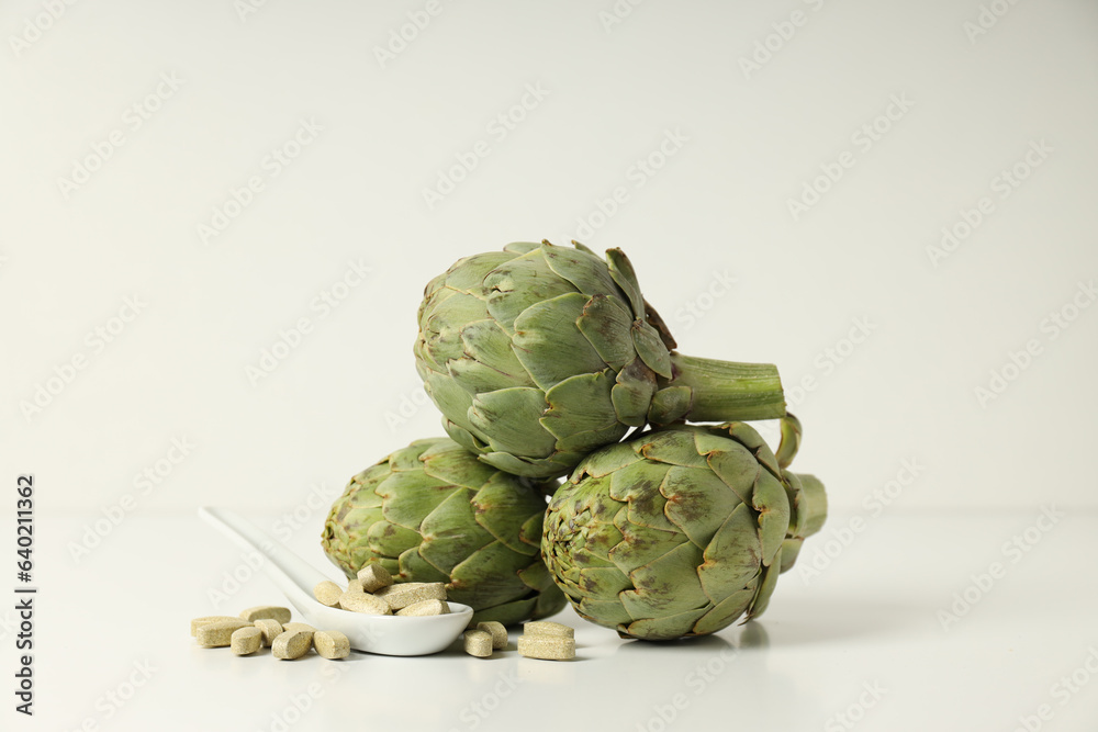 Obraz premium Products for healthcare, healthcare concept - artichoke medicine
