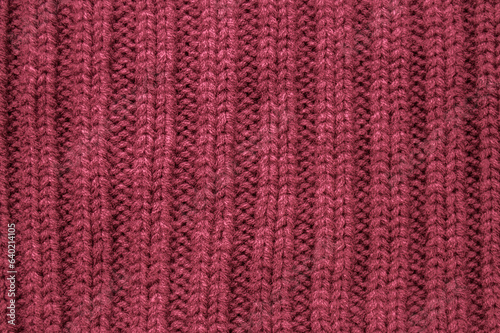 Organic knitted material with macro woven threads.