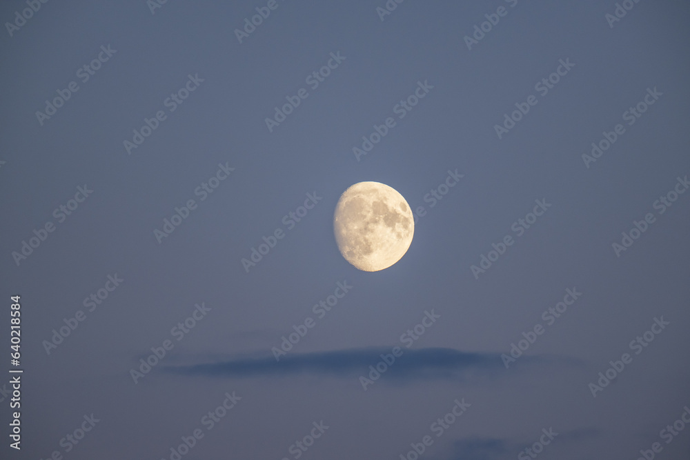 moon in the blue sky with white clouds background moon in the blue sky with white clouds background