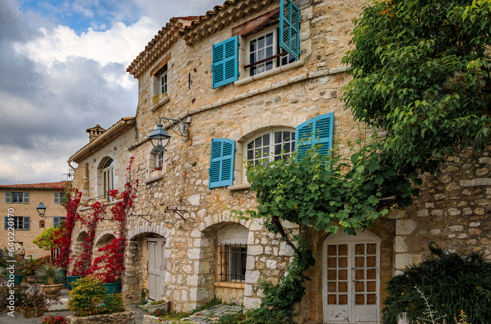 Traditional old stone houses on a street in the medieval town of Saint Paul de Vence, French Riviera, South of France