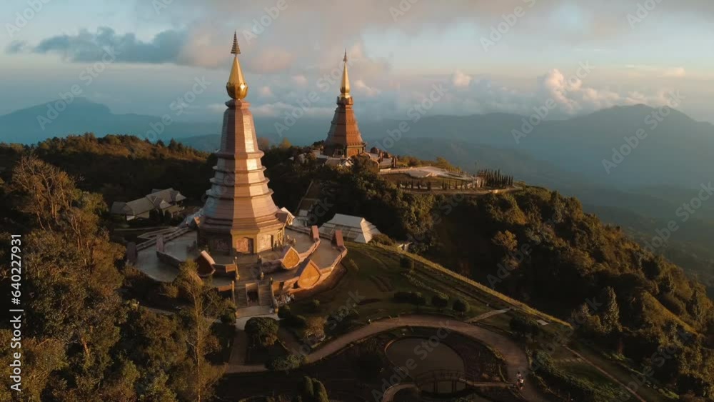 Drone video of Grand Pagodas at sunset, Doi Inthanon, Chiang Mai, Thailand Asia