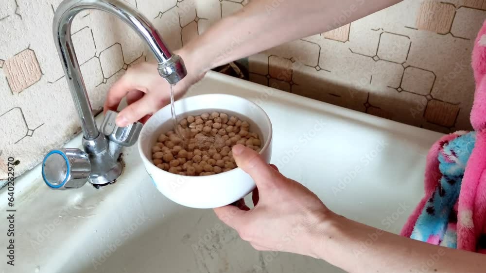 Washing of chickpeas or peas over kitchen sink
