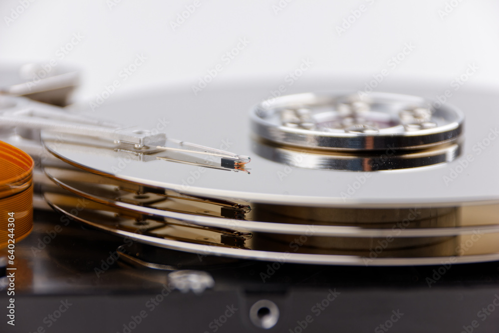 hard drive and magnifying glass, representing the process of searching and saving data hard drive and magnifying glass, representing the process of searching and saving data