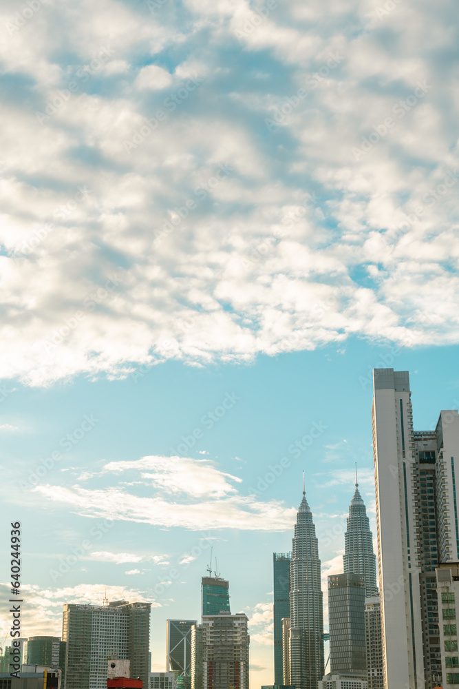 Skyscraper buildings with cloud sky in Kuala Lumpur, Malaysia