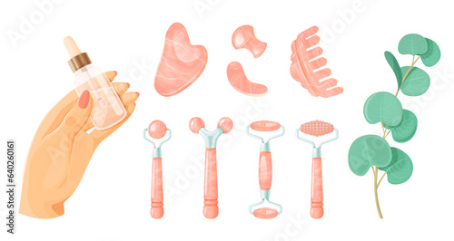 Set of rollers and pink gua sha facial massager tools on a white background.