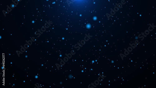 Blue dust particles with flare on black background