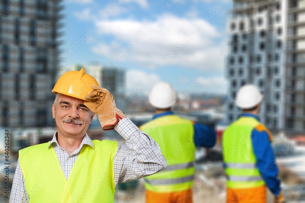 Engineering team on construction site for building project Engineering team on construction site for building project