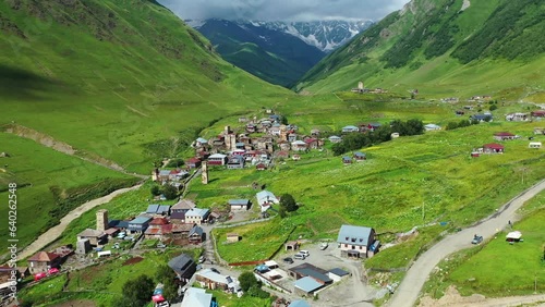 Ushguli village with buildings aerial view from drone. Located at head of Enguri gorge in Svaneti, Georgia. Ushguli is one of highest continuously inhabited settlements in Europe with famous Svan