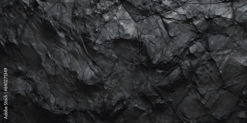 Black white rock texture. Rough mountain surface. Close-up. Volumetric stone background with space for design. Dark gray grunge backdrop. Wide banner. Panoramic © Jing