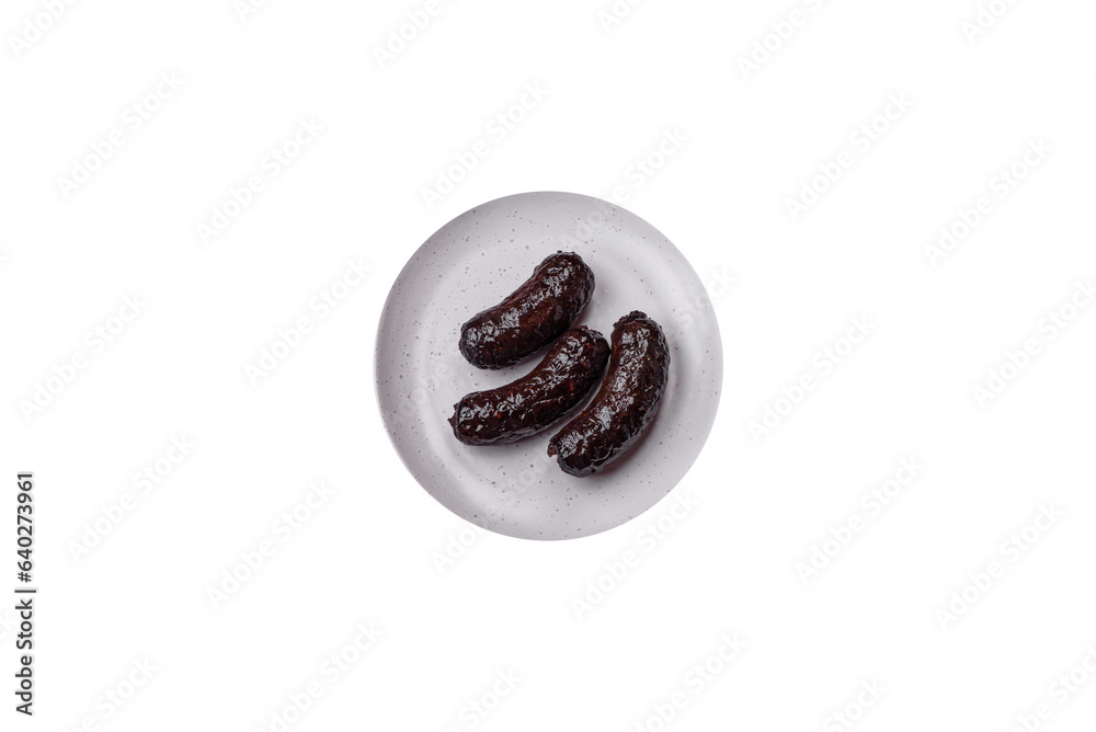 Obraz premium Delicious black blood sausage or black pudding with spices and herbs
