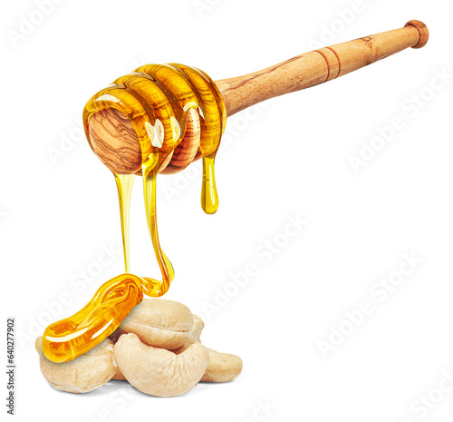 dripping honey on cashew nuts isolated on a white background