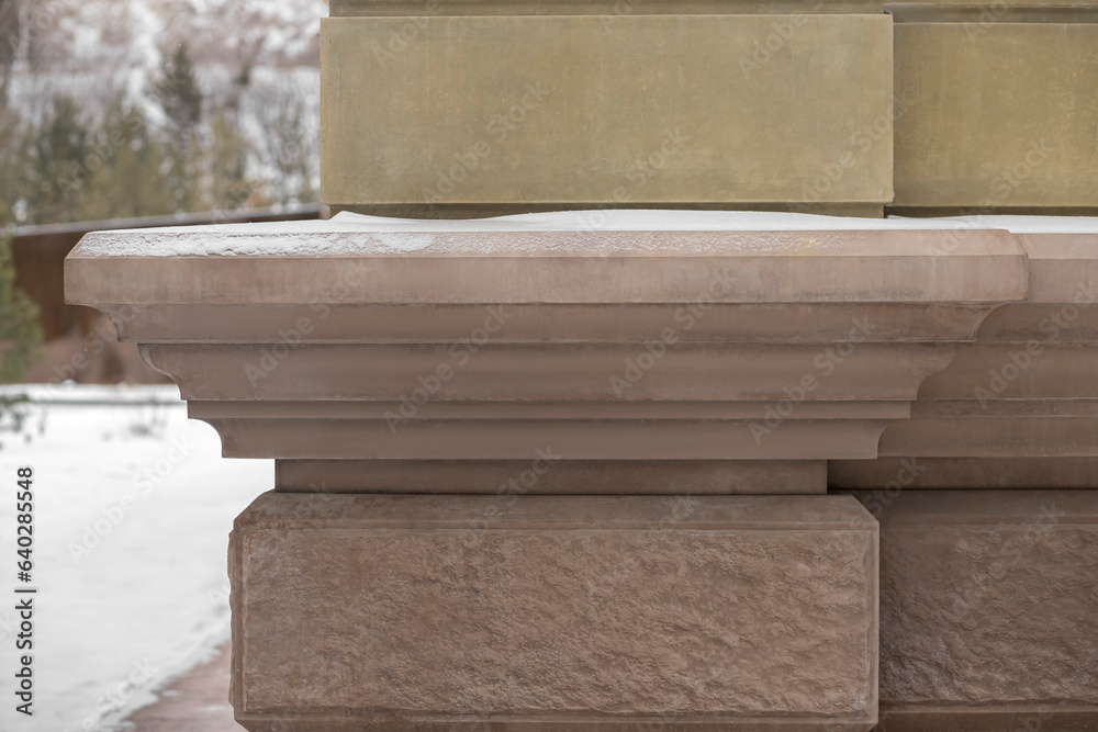 A building finished with concrete embellishments A building finished with concrete embellishments
