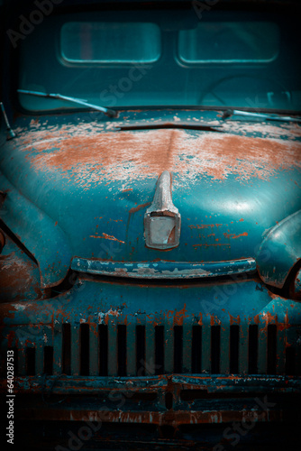 Old vintage rusty car front view closeup details