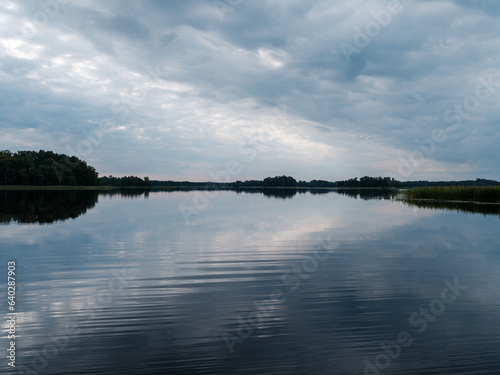 Fototapeta Naklejka Na Ścianę i Meble -  calm evening rest by the lake