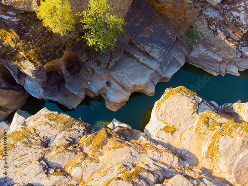 Panorama landscape of rock formations of Tasyaran Valley Natural Park canyon (aka Taşyaran Vadisi) at sunset. Located in Usak (Uşak), Turkey photo